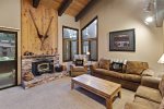 Wildflower Mammoth Condo Rental 44: Living Room with Wood Stove